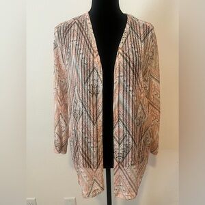 Peach, lacy sheer shell